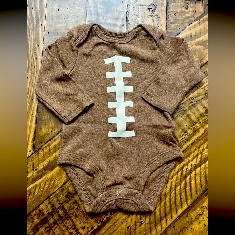 Like new, newborn football onesie